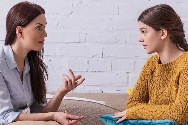 Mom and daughter talking