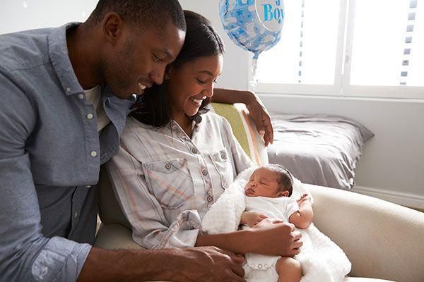 newborn baby with happy parents